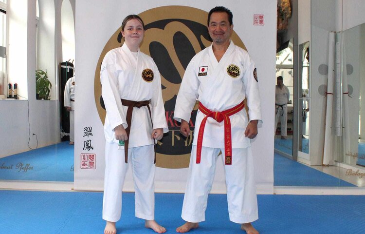 Image of Elkie Trains with 10th Dan Grand Master in Vienna
